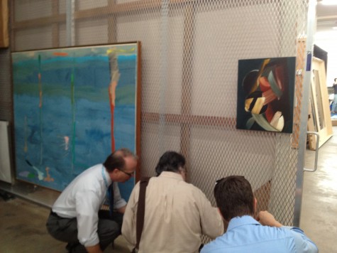 Joel Ferrell, Bob LaVallee, and Mark Leonard looking at the back of our Rothko painting currently in art storage. 