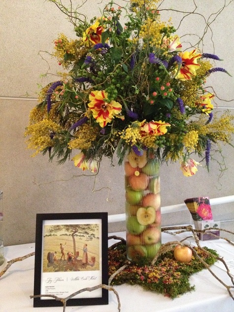 Floral arrangement  inspired by Camille Pissarro’s Apple Harvest in the DMA’s collection