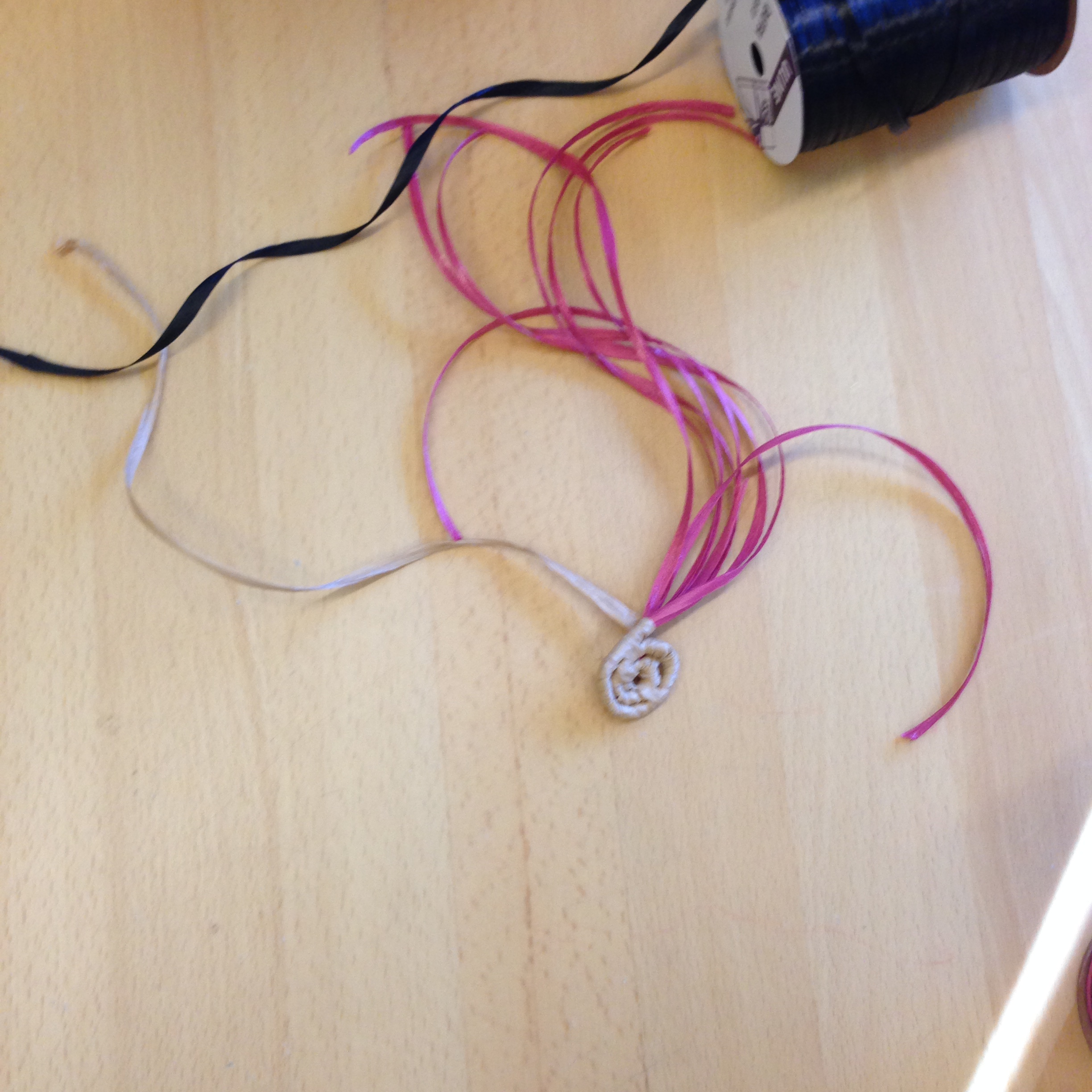 If you want to switch colors, cut a strand of the alternate color.