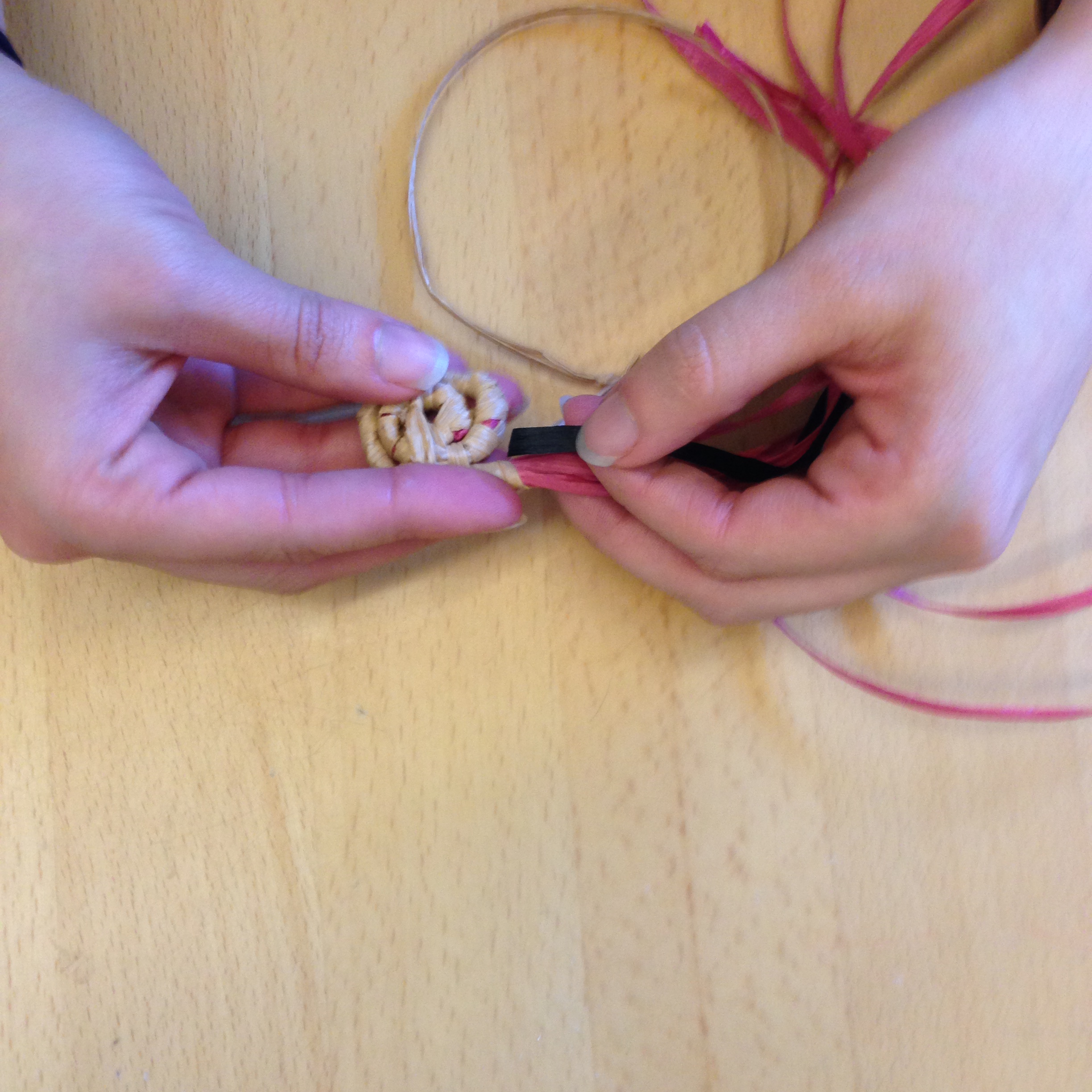 Line your new strand up as if it was part of the red basket core.