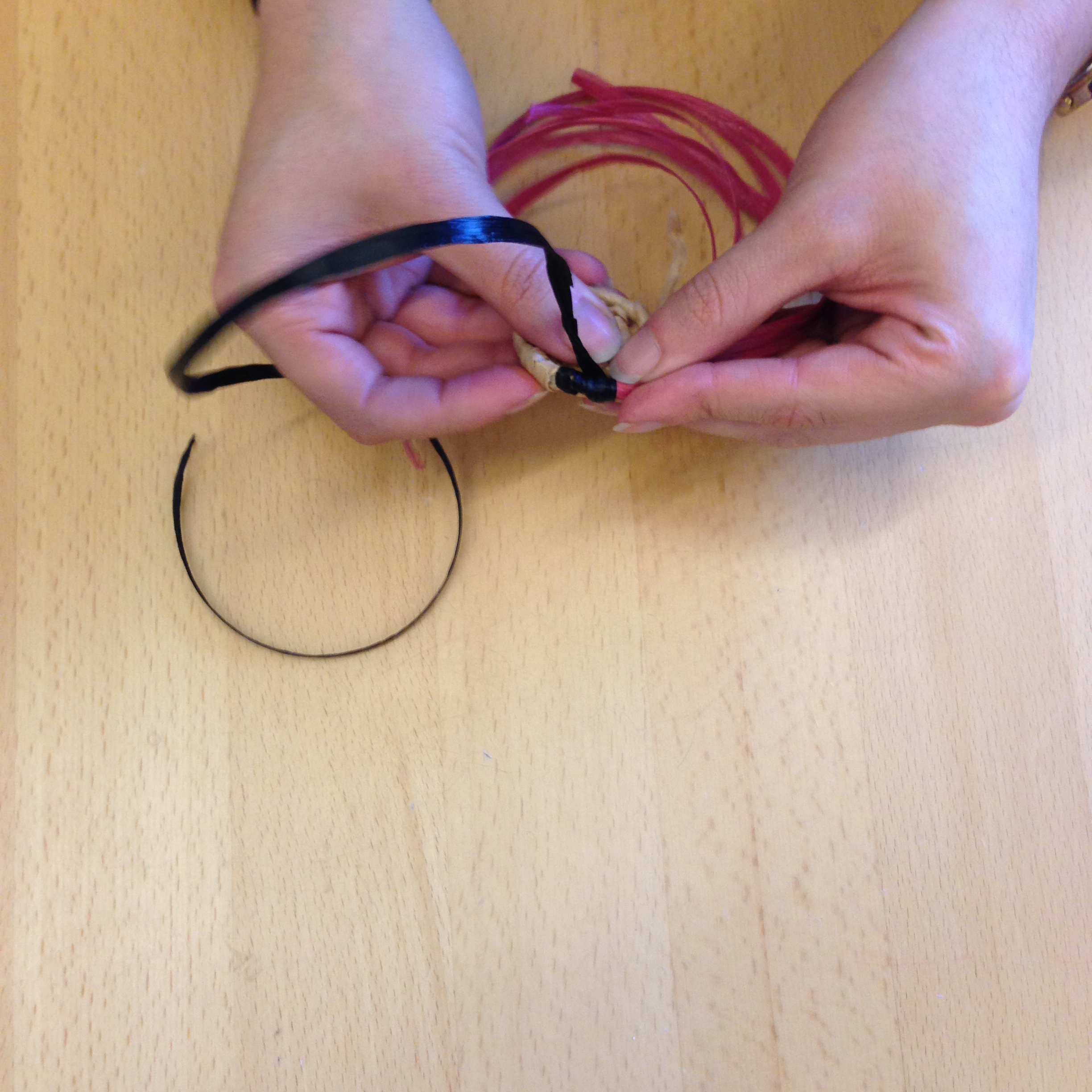 Continue wrapping the basket core, securing the newly wrapped coil to the previous coils every few inches.