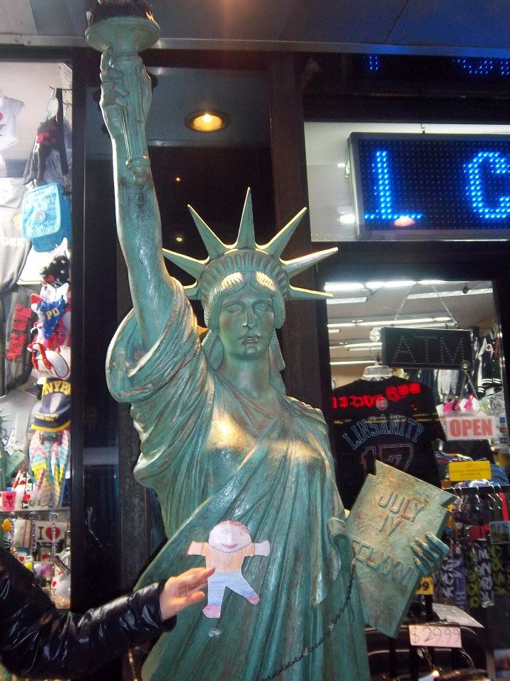 With a replica of the Statue of Liberty in New York