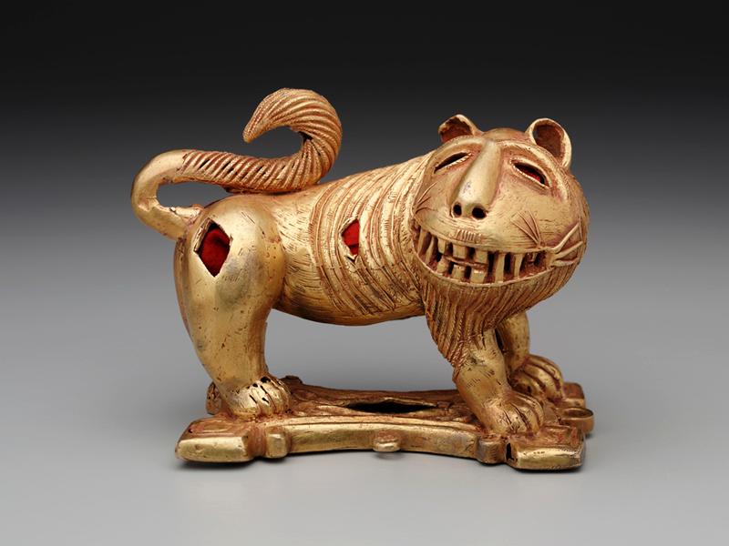 Sword ornament in the form of a lion