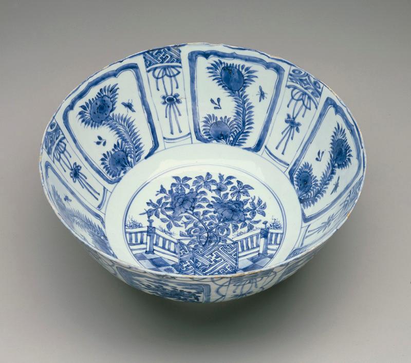 On the inner wall are six panels containing stylized peach branches. The peach is believed to ward off evil and represents springtime, marriage, and immortality.