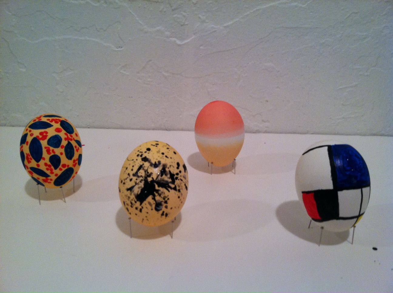 Artful eggs. L-R: Henri Matisse, Ivy Flower; Jackson Pollock, Cathedral; Mark Rothko, Untitled; Piet Mondrian, Composition with Large Blue Plane, Red, Black, Yellow, and Gray
