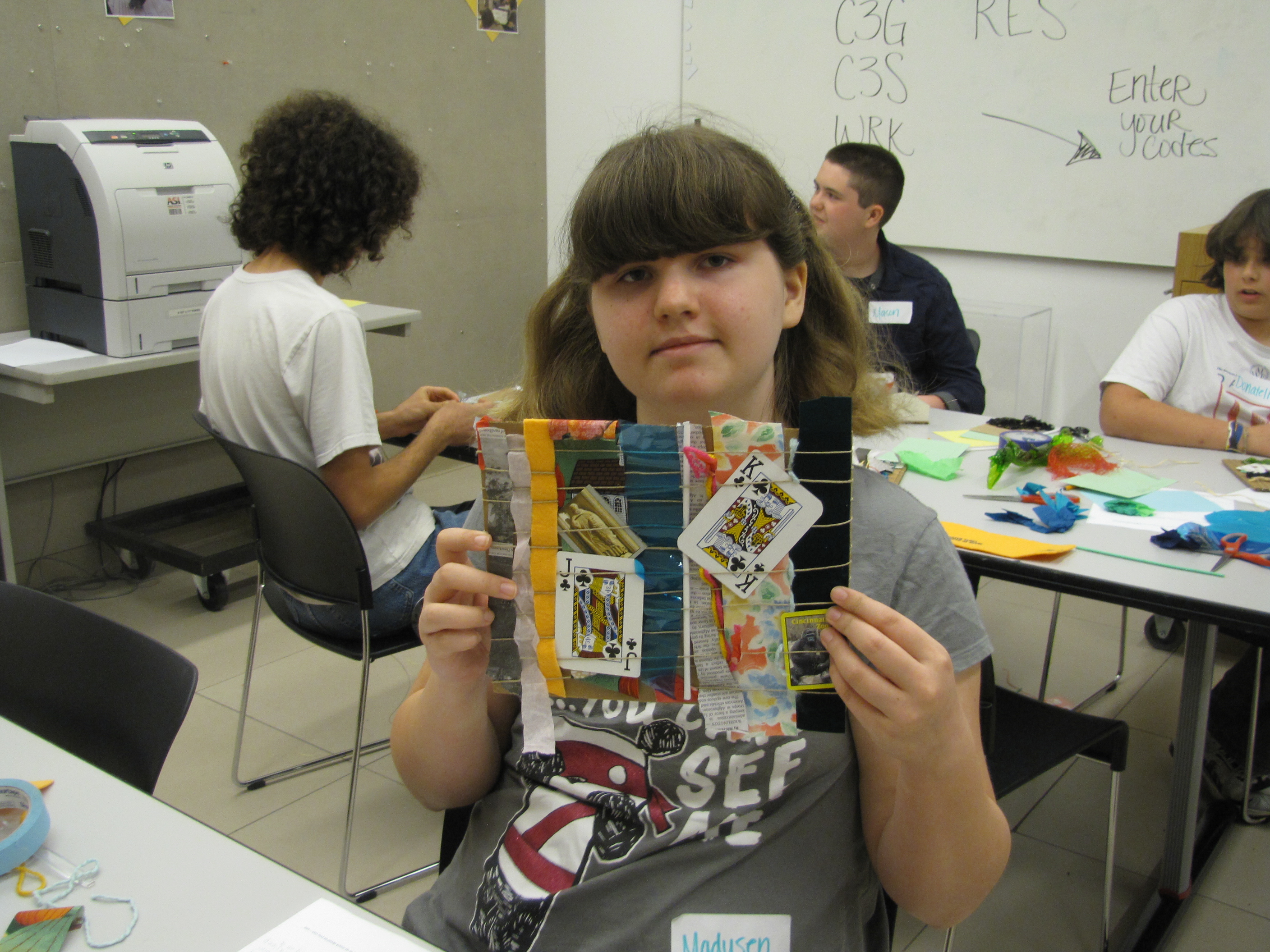 Conceptual Weaving project where materials were chosen to represent a certain thought. Our teen's word  was playful. 