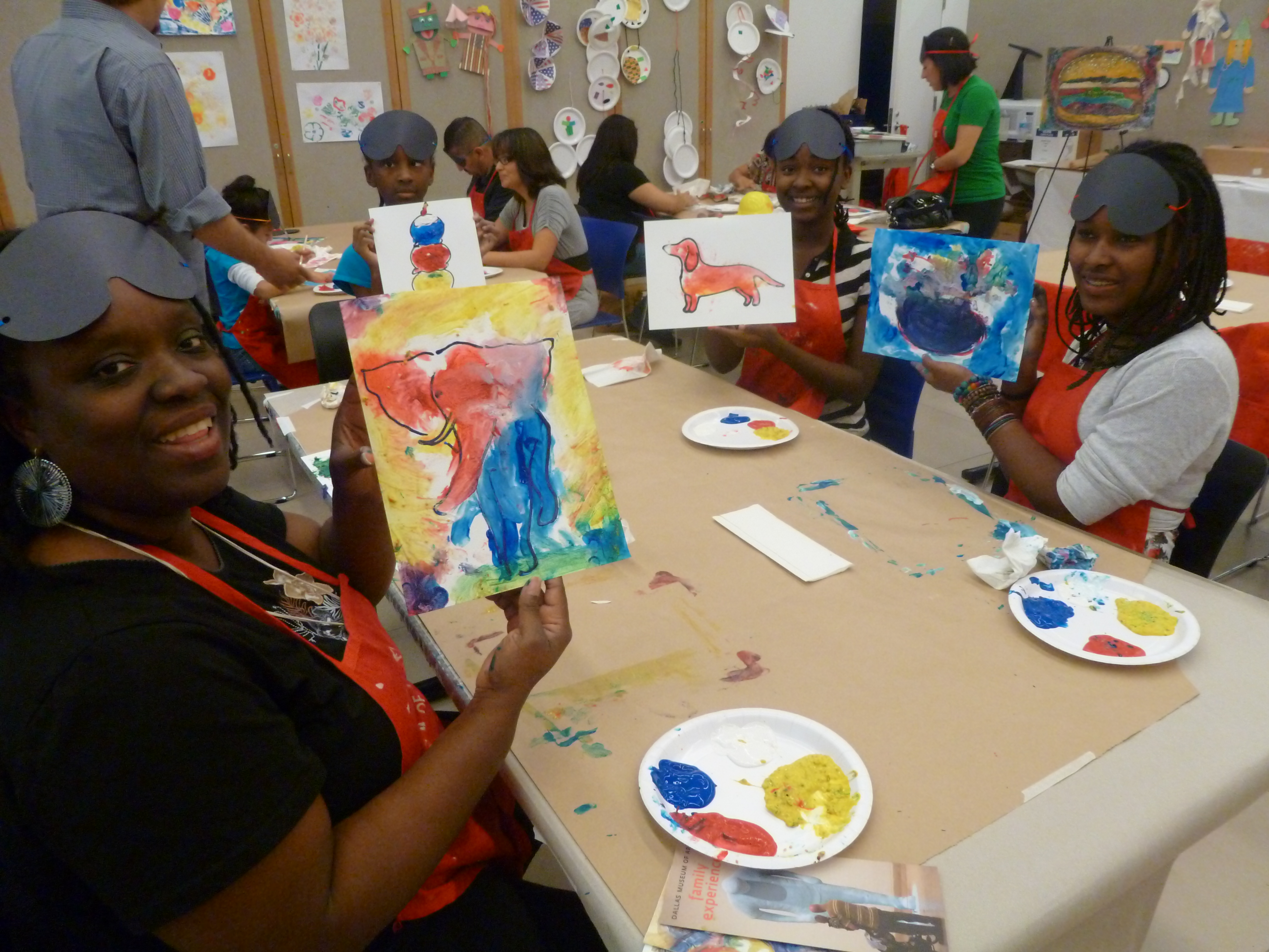 Visitors experience John Bramblitt's Sightless Painting activity