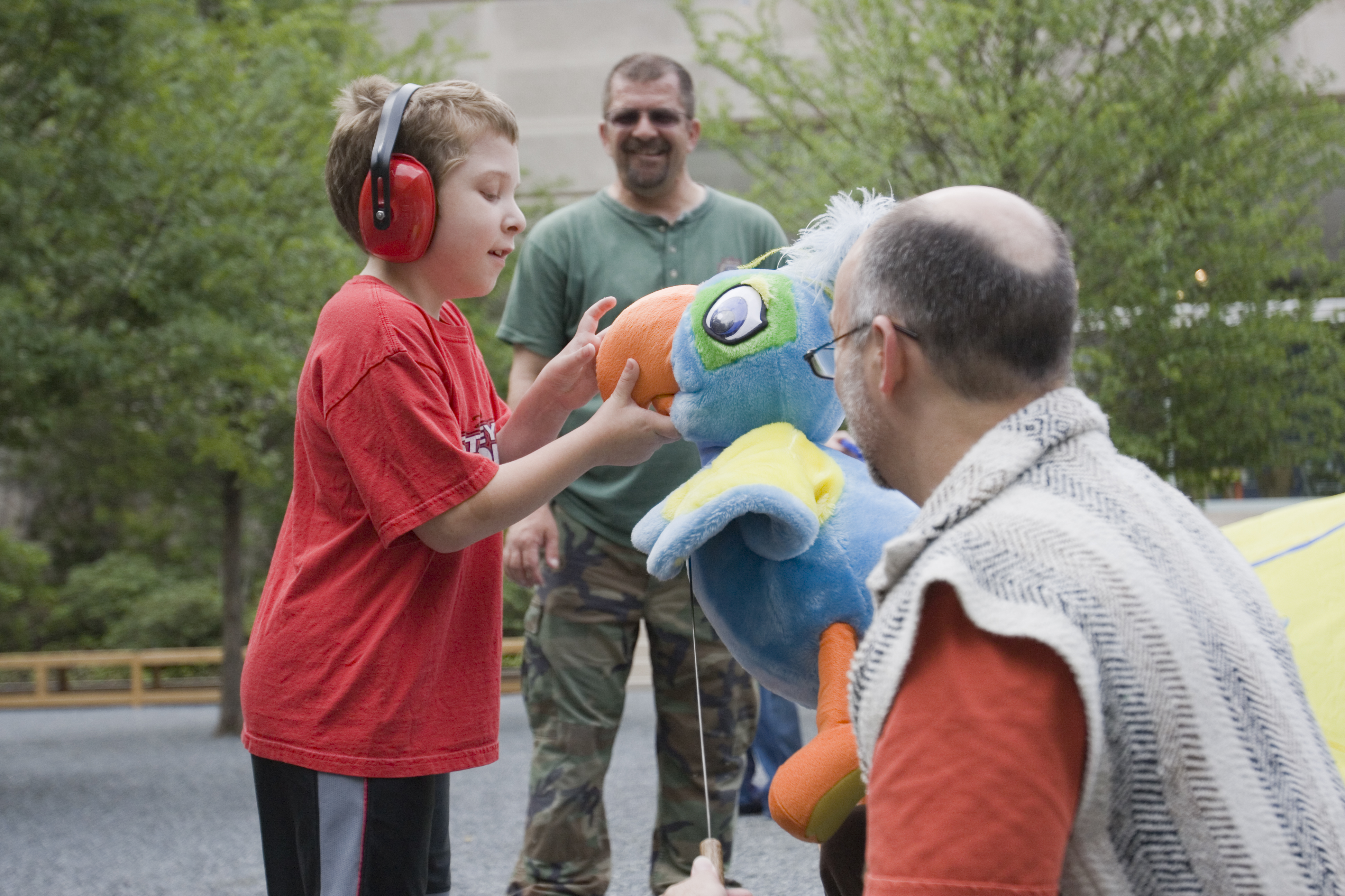 A family participating in an Autism Awareness Family Celebration at the DMA