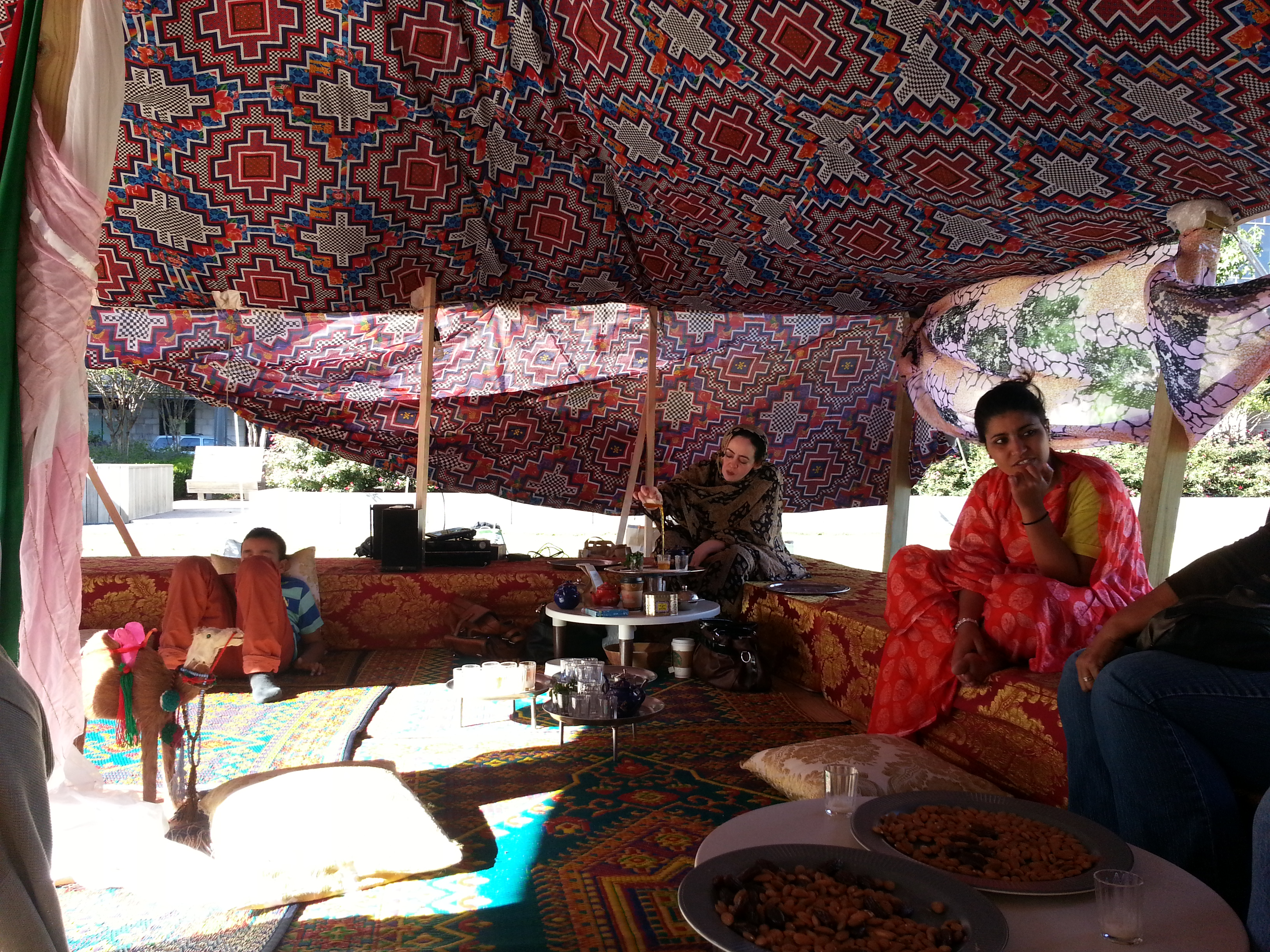 Najat prepares the tea.