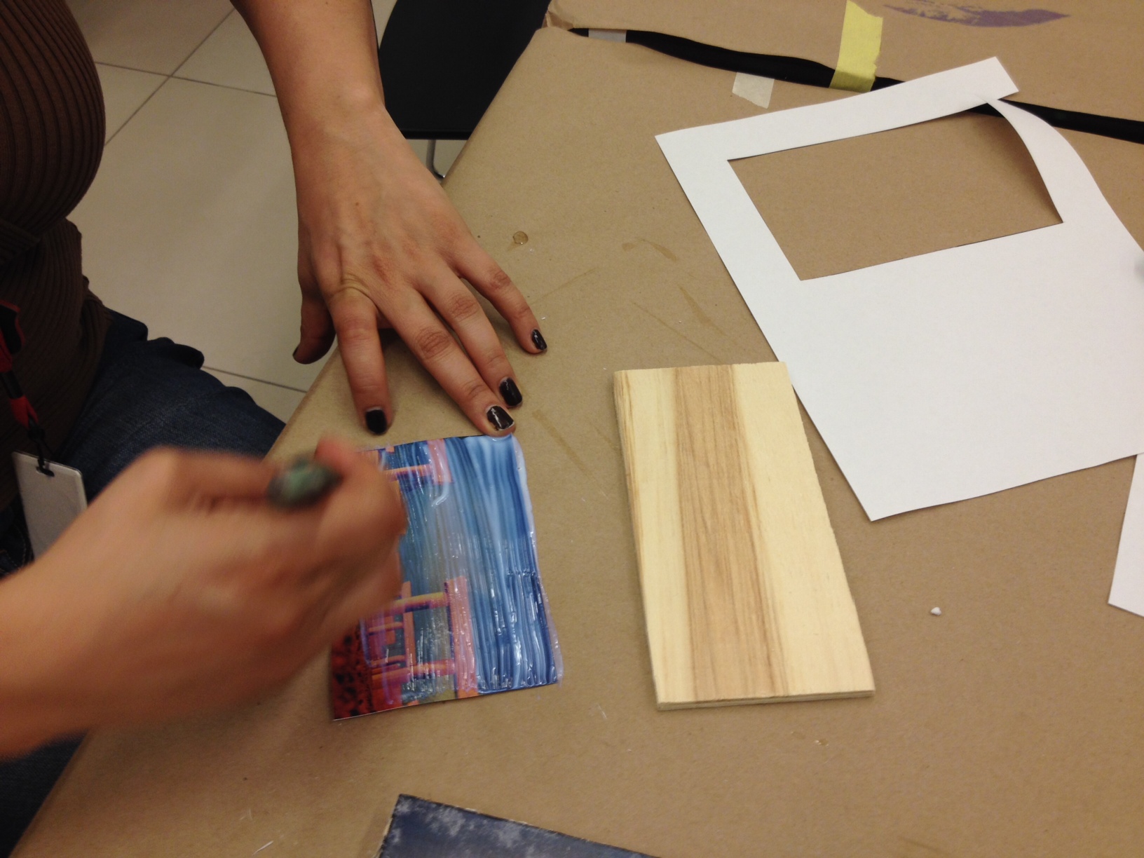 Brush gel medium directly onto image.