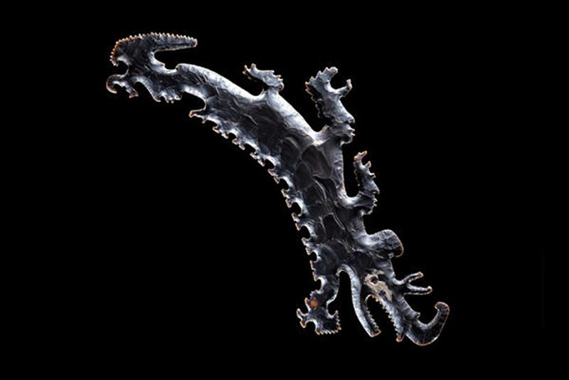 Guatamala, Maya culture, Eccentric flint depicting a crocodile canoe with passengers, A.D. 600-900,  Dallas Museum of Art, The Eugene and Margaret McDermott Art Fund, Inc., in honor of Mrs. Alex Spence